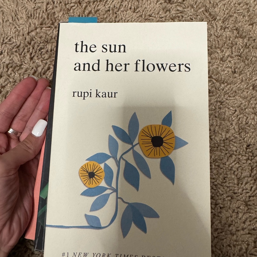 The Sun and Her Flowers Book